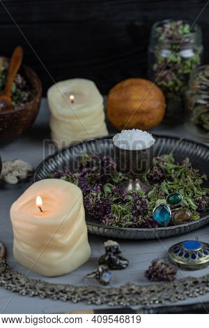 Magic Altar With Mystical Herbs, Salt, Candles And Crystals. Witch Sanctuary Sacred Esoteric Concept