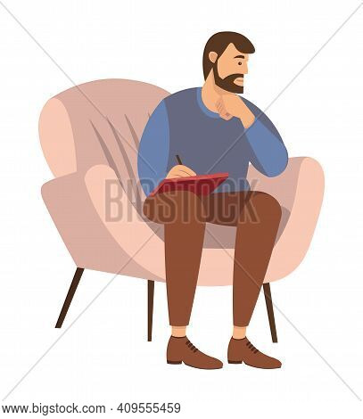 Bearded Man Is Sitting On A Chair And Writing In Notebook. Psychotherapist With Notepad In Hand Writ