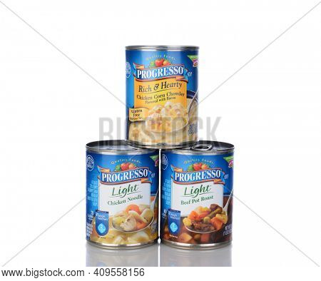 IRVINE, CA - January 05, 2014: Three cans of Progresso Soups. Soups include Light Chicken Noodle, Light Beef Pot Roast and Rich and Hearty Chicken Corn Chowder.  