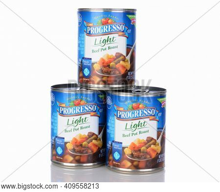 IRVINE, CA - January 05, 2014: Three cans of Progresso Light Beef Pot Roast Soup. Progresso, owned by General Mills has been making soups for over 90 years.