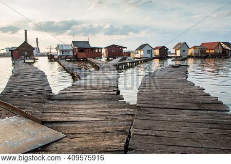 A Picture From Hungary, From A Place Called Bokod. The Local People Have The Wooden Cottages On Pylo