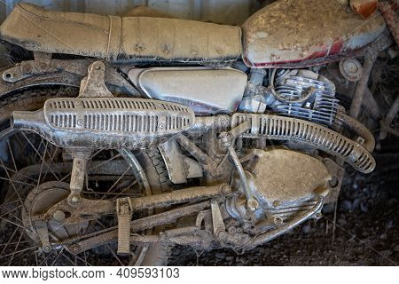 Close Up Of The Motor Of A Rusted Vintage Motorcycle Covered In Dirt And Cobwebs