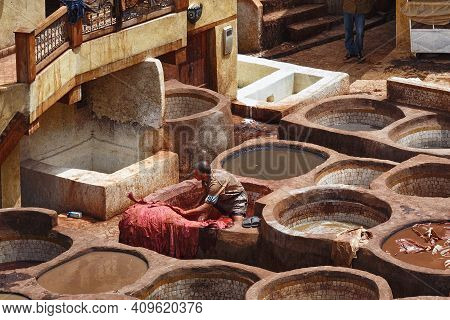 Fez, Morocco - May 31, 2017: Unknown Woker In The Tannery In Fez. The Tanning Industry In The City I