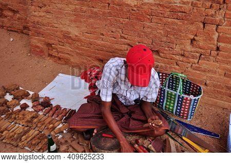 Burmese Men Craftsmanship People Sit On Floor Carving Wooden Toy Souvenir Gift For Sale Travelers In