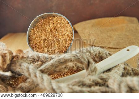 Teff, Gluten-free Alternative To Ancient Grains, Is Popular Choice For Healthy Diet. Burlap And Wood