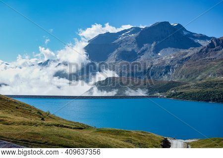 Summer View Of The Artificial Mont Cenis Lake, In The Savoy Department Near Lanslevillard, Rhone-alp