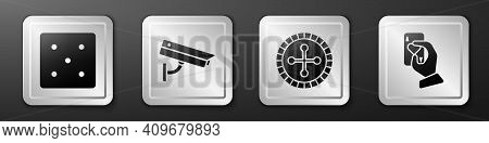 Set Game Dice, Security Camera, Casino Roulette Wheel And Hand Holding Playing Cards Icon. Silver Sq