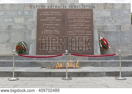 Sevastopol, Crimea, Russia - July 28, 2020: Eternal Flame At The Obelisk Of Glory To The Soldiers - 