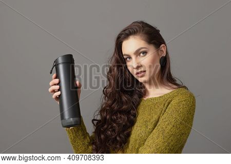 Woman Holding Eco Reusable Smart Thermo Water Bottle With Drink Reminder, Healthy Lifestyle Concept