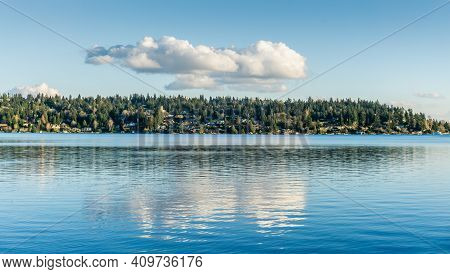 Clouds Hover Over Mercer Island On Lwke Washington In Washington State.