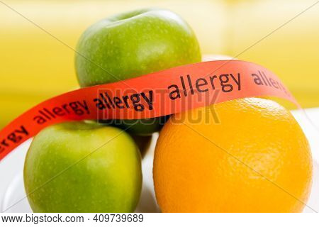 Ribbon With Allergy Lettering Near Fresh Fruits.