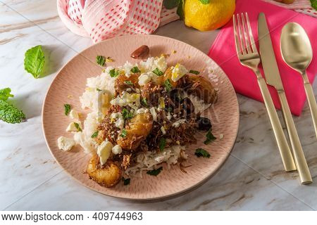 Greek Shredded Lamb Stew Marinated In A White Wine Salmoriglio Sauce With New Potatoes Kalamata Oliv