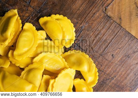 Small Ravioli With Wavy Edges, Cheese Or Meat To Cook In Broth, A Traditional Dish For Celebrations 