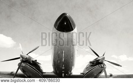 Old Propeller Airplane Closeup Nose View Black And Ehite