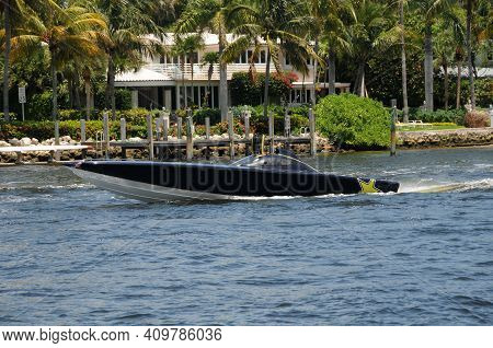 Expensive Racing Speed Boat Cruising The South Florida Waterways