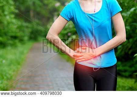 Side Pain - Woman Runner Side Cramps After Running. Jogging Woman With Stomach Side Pain After Joggi