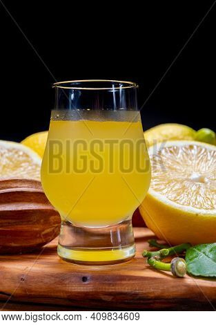 Ice Cold Sweet Limoncello Liqueur Made From New Harvest Of Fresh Ripe Yellow Italian Lemons, Amalfi