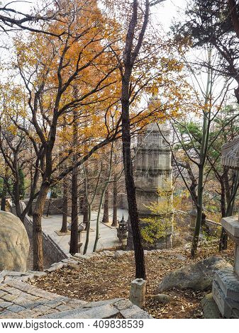 Qingdao, China - December 2017: Courtyard With Large Stupa Built In The Ing Dynasty Necxt To The Hua