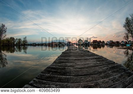 A Picture From Hungary, From A Place Called Bokod. The Local People Have The Wooden Cottages On Pylo