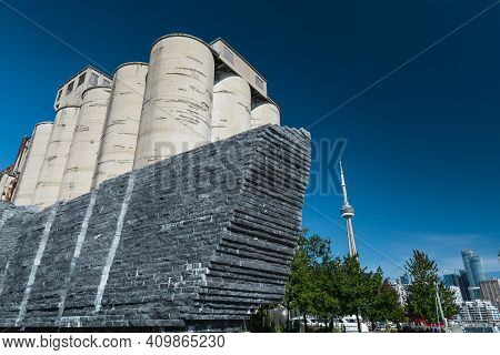 Toronto,ontario,canada, Oct.11,2019, Great Abstract View Of A Dark Stone Wall With Old Concrete Plan