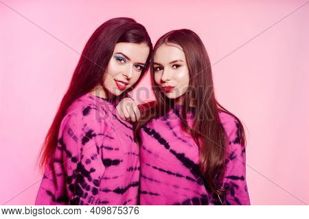 2 Girls In The Same Things With Bright Makeup. Brunette Girls, Sisters, Girlfriends, Twins. Women's