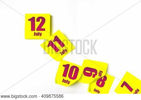 July 12nd. Day 12 Of Month, Calendar Date. Many Yellow Sheet Of The Calendar. Summer Month, Day Of T