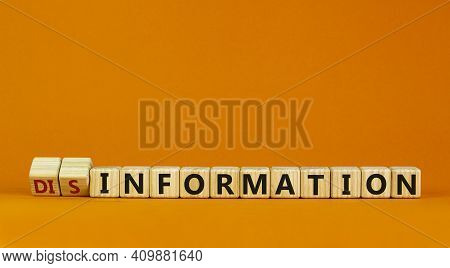 Information Or Disinformation Symbol. Turned Cubes And Changed Words Disinformation To Information. 