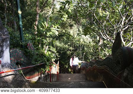 Travelers Thai Women Walking Up On Naga Serpent Stairway Go To Tham Muang On Cave Formerly Named Tha