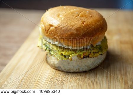 Close Up Shot Of A Delicious Omelette Burger. Egg Burger