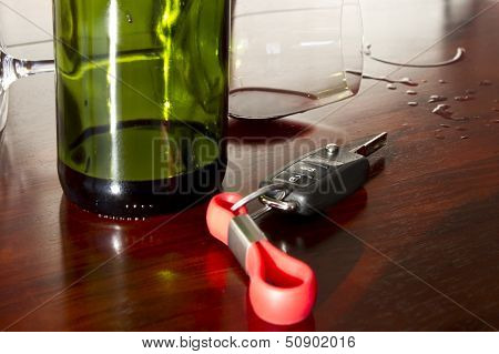 Bottle of wine with car key