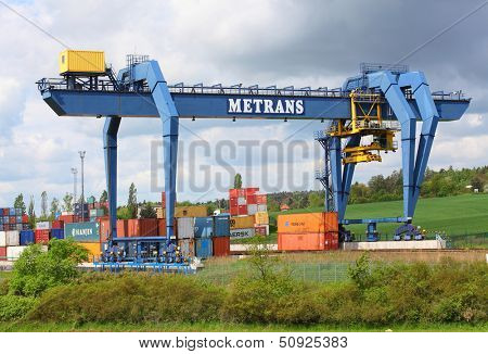 NYRANY, CZECH REPUBLIC - MAY 25: Big container terminal on a railroad with open storage area 50 000 sqm. Terminal has a capacity of 40 trucks/day. May 25, 2013 in Nyrany, Czech Republic. 