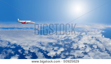 Private airplane inflight in the sky above clouds