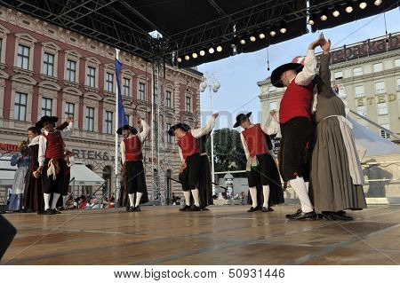 ZAGREB,CROATIA - JULY 19: Members of folk groups Santa Gorizia from Italy during the 47th International Folklore Festival in center of Zagreb,Croatia on July 19,2013