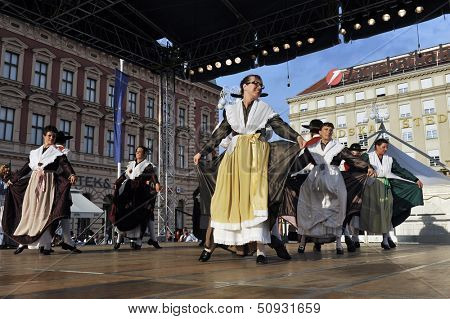ZAGREB,CROATIA - JULY 19: Members of folk groups Santa Gorizia from Italy during the 47th International Folklore Festival in center of Zagreb,Croatia on July 19,2013