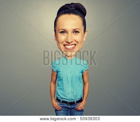 smiley bighead girl looking at camera over dark background