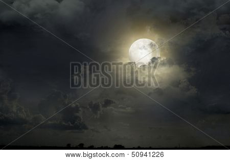 Full moon in the clouds