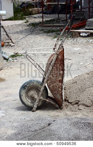 Wheelbarrow At Construction Site At Siesta Time