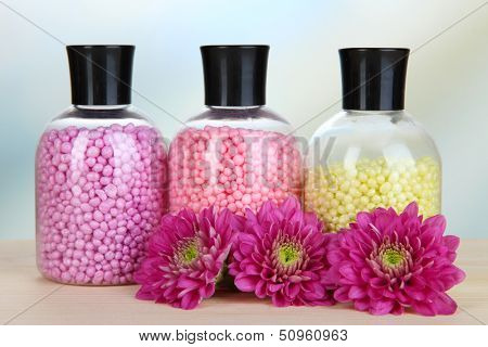 Aromatherapy minerals - colorful bath salt on light background