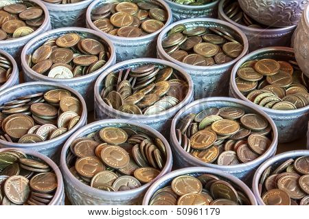 Coins in Silver bowl.