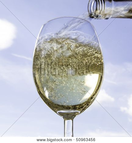 Pouring Wine Into A Wine Glass