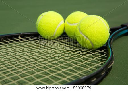 Tennis Balls on a Racket with room for copy 