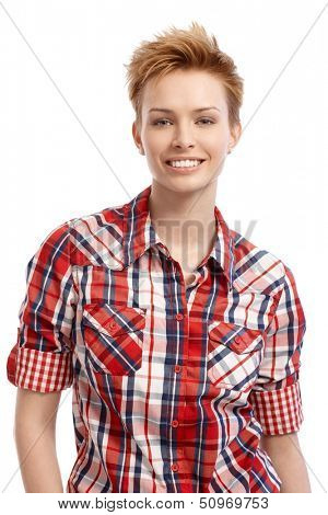 Portrait of young attractive gingerish woman with short hair.