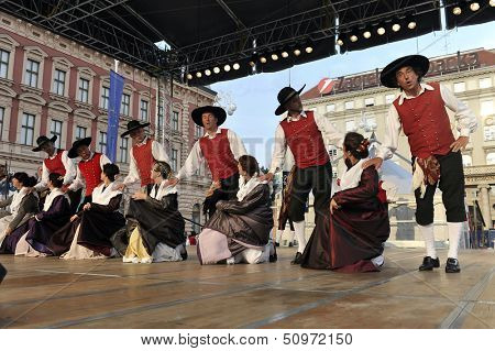 ZAGREB,CROATIA - JULY 19: Members of folk groups Santa Gorizia from Italy during the 47th International Folklore Festival in center of Zagreb,Croatia on July 19,2013