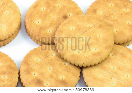 Yellow biscuits on white background