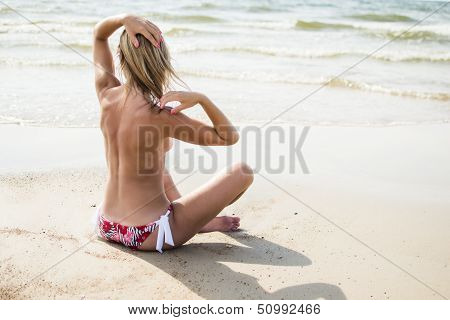 Young pretty topless girl
