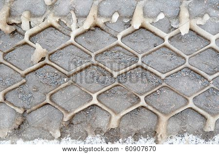 Background Traces Of Protectors Of The Tire On Wet Thawing Snow