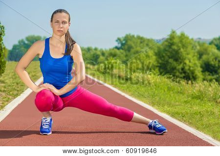 Athletic Woman - Stretches