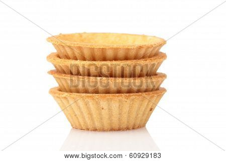 Stack Of Empty Tartlets On White