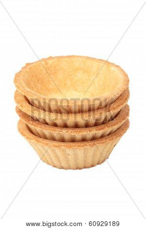 Stack Of Empty Tartlets On White