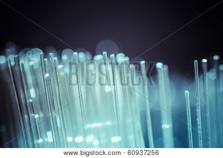 Fiber optic cables, fibre connection, telecomunications concept.